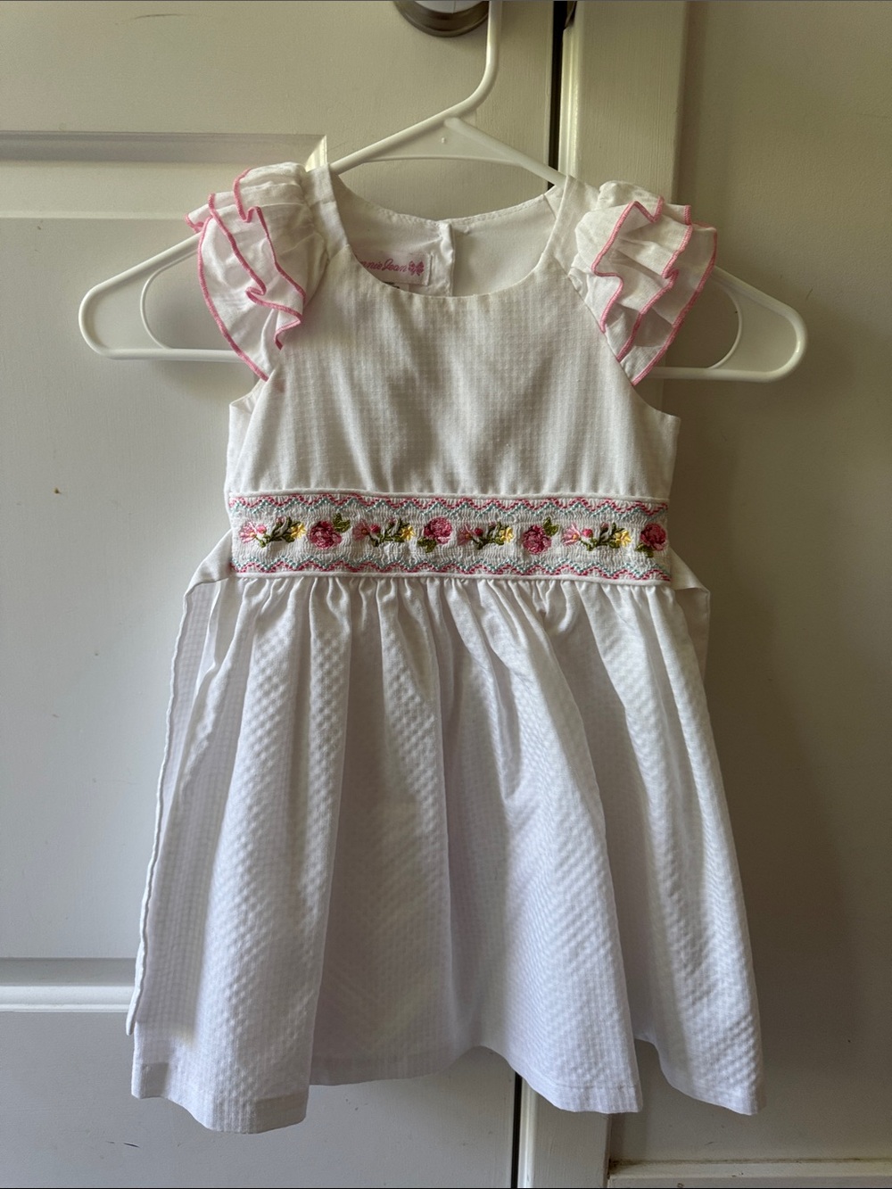 Bonnie Jean White Dress with Pink Trim and Floral Smocking
